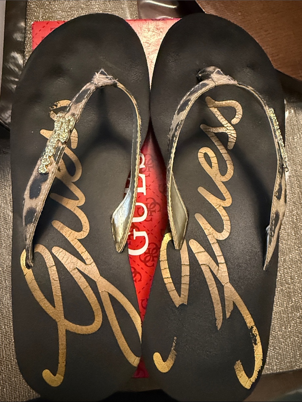 G by Guess Black and Gold Signature Leopard-Print Thong Sandals
